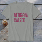 Grey v-neck t-shirt with pink "GEORGIA RAISED" text.