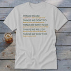White t-shirt with text listing "Things We Did", "Things We Didn't Do", and more.