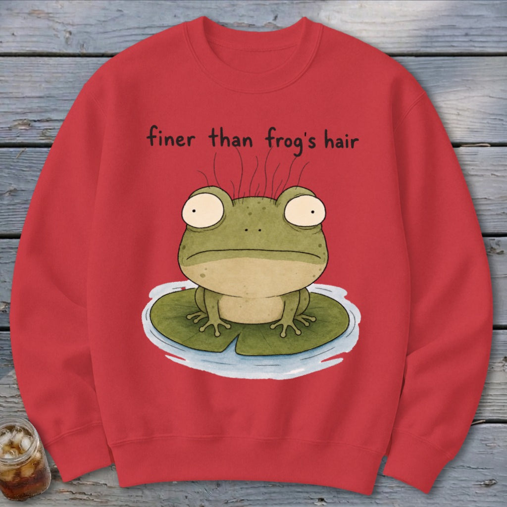 A red crewneck sweatshirt featuring a cartoon frog on a lily pad with the text finer than frog's hair.
