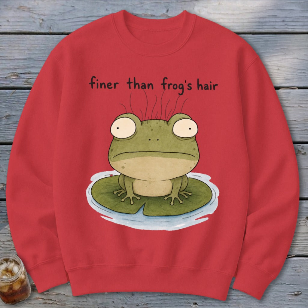 A red crewneck sweatshirt featuring a cartoon frog on a lily pad with the text finer than frog's hair.