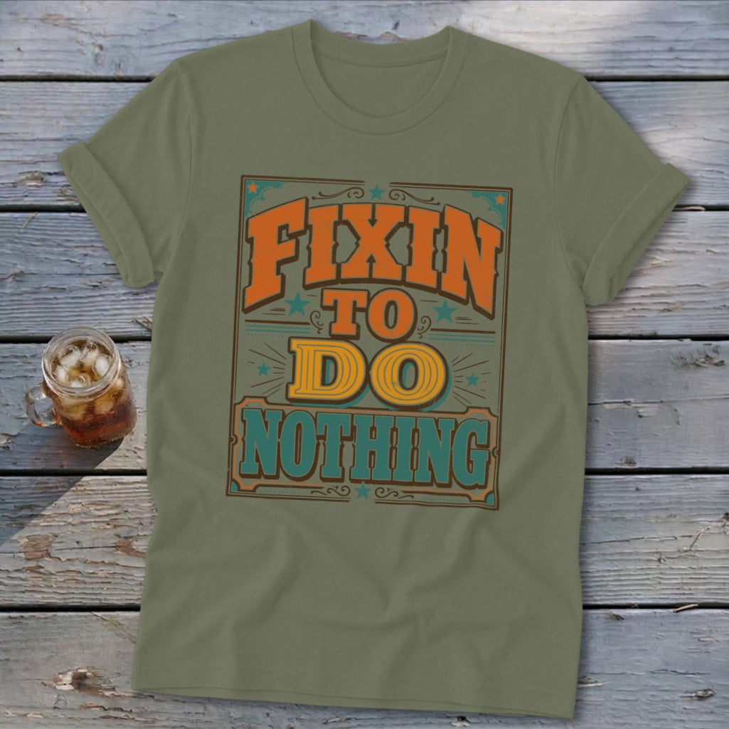 Green t-shirt with "Fixin to Do Nothing" text in orange, yellow, and teal lettering.