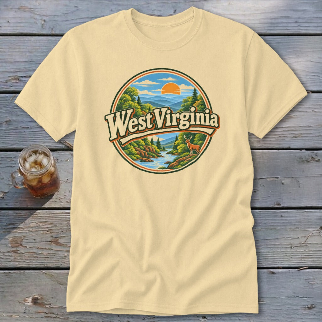 Light yellow t-shirt with a circular graphic of West Virginia mountains, river, and deer.