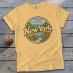 Yellow t-shirt with vintage New York mountain landscape graphic and deer.