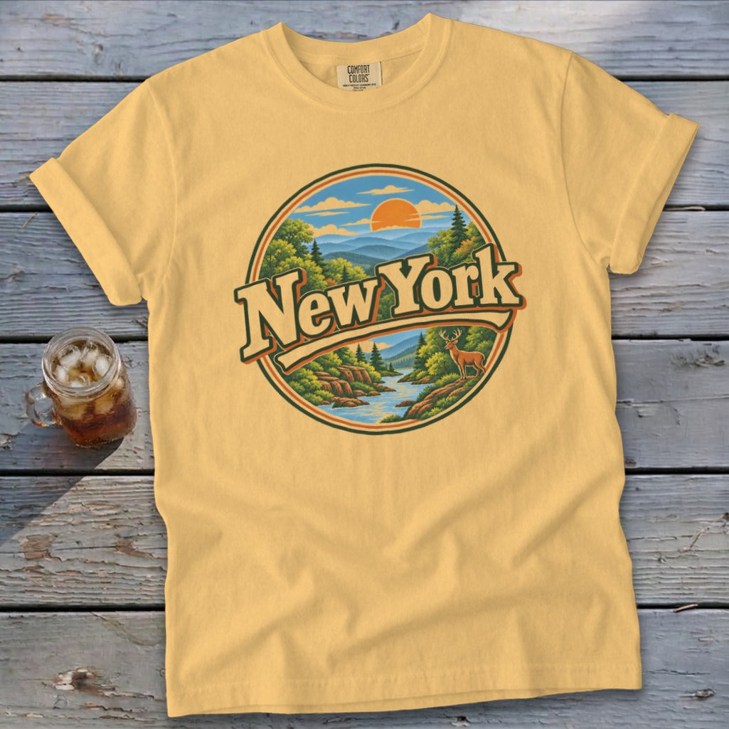 Yellow t-shirt with vintage New York mountain landscape graphic and deer.