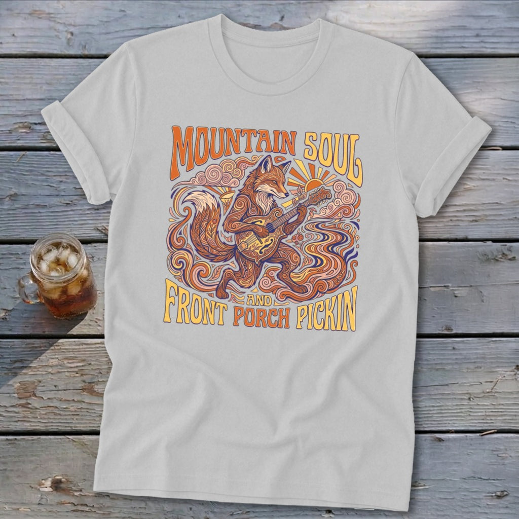 Light gray t-shirt with a fox playing a guitar and "Mountain Soul And Front Porch Pickin'" text.