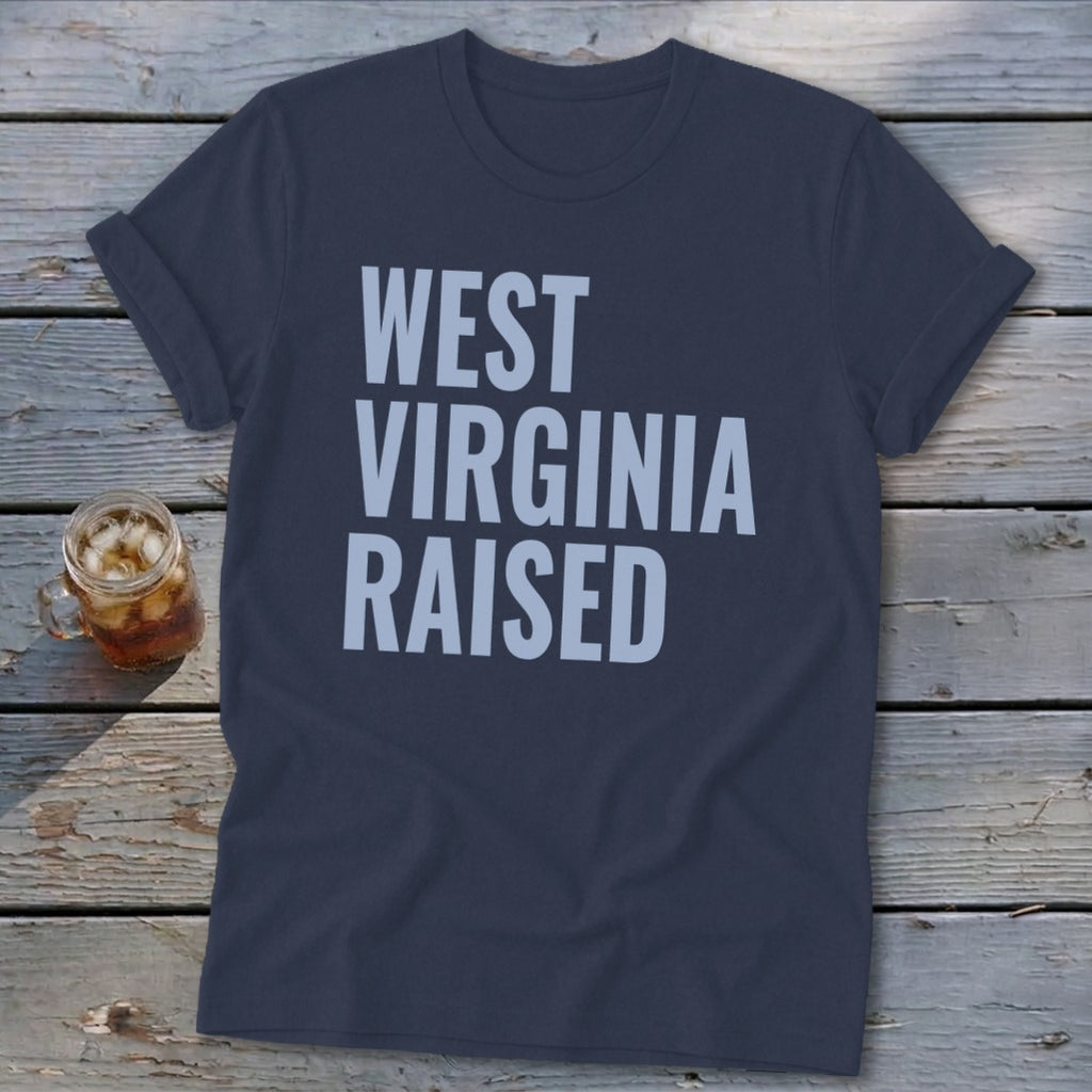 Navy t-shirt with "WEST VIRGINIA RAISED" in light blue text.