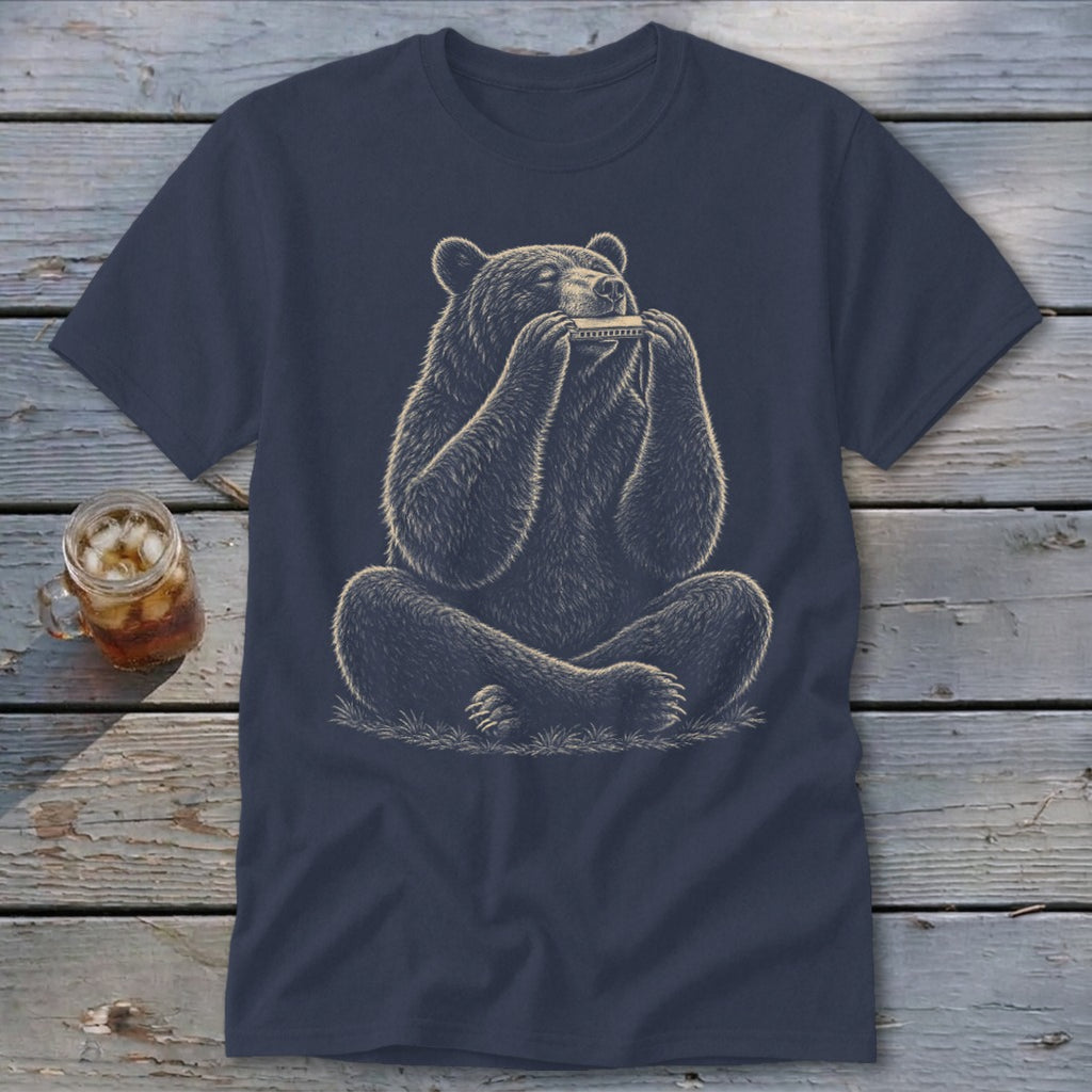 Bear sitting cross-legged playing a harmonica on a navy blue t-shirt.