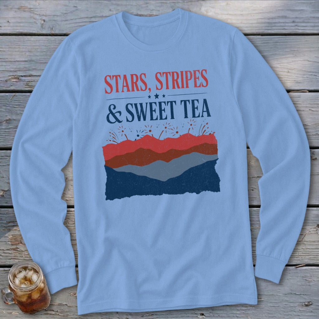 Light blue long-sleeved crewneck shirt with distressed red, blue, and grey graphic text reading Stars, Stripes & Sweet Tea.