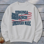 White sweatshirt with American flag graphic and text: Virginia Raised, American Made.