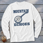 A white long-sleeved shirt featuring blue text that reads "MOUNTAIN ECHOES" with a banjo illustration between the words.