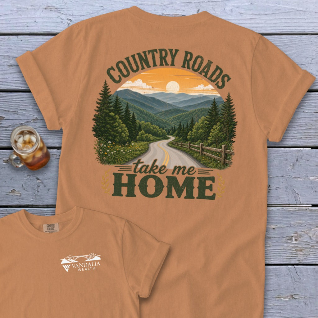 Orange t-shirt with a scenic mountain road graphic and text "Country Roads take me HOME".