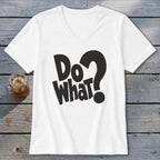 White V-neck t-shirt with black text that reads Do What? resting on a rustic wooden background.