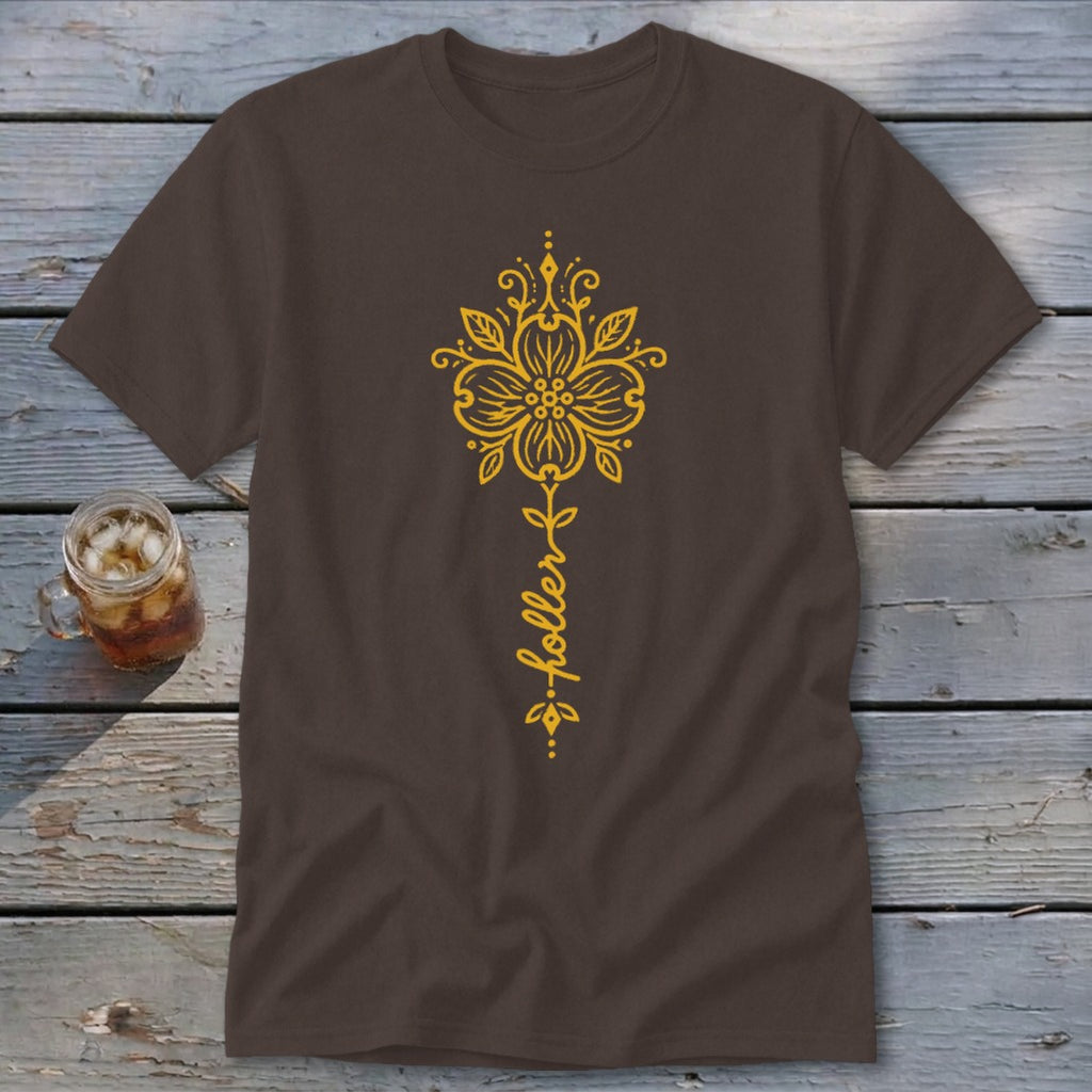 Brown t-shirt with yellow floral design and the word "foller".