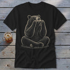 Black t-shirt with a drawing of a bear playing a harmonica.