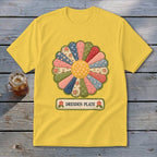 Yellow t-shirt with a colorful Dresden Plate quilt block design and "DRESDEN PLATE" text.