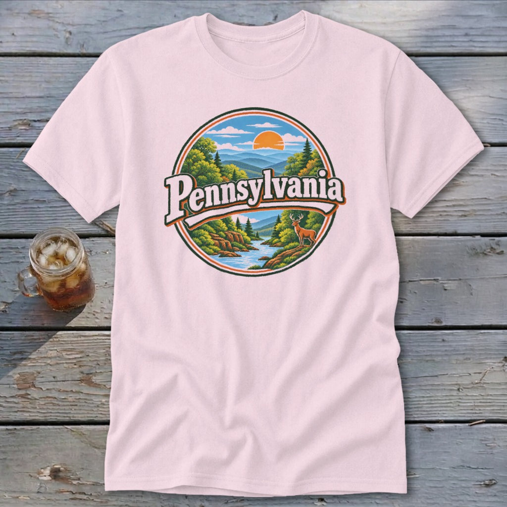 Pink t-shirt with circular Pennsylvania landscape graphic featuring mountains, river, and deer.