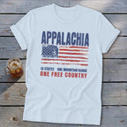 Light blue t-shirt displaying a distressed American flag graphic with Appalachia text on wooden planks.