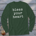 Dark green long sleeve shirt with white text that reads "bless your heart".