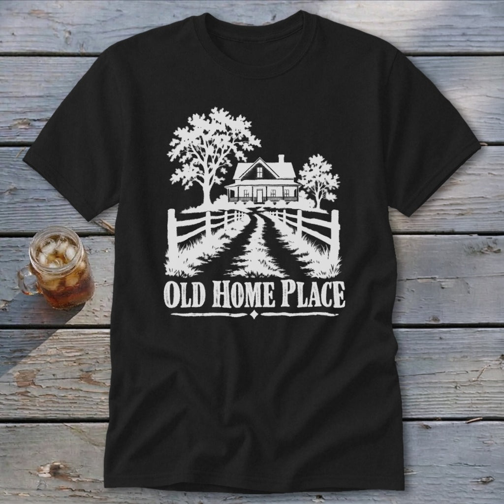 Black t-shirt with white graphic of a house, trees, fence, and text "OLD HOME PLACE".