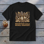 Black t-shirt with a "Mountain Gold Morel Harvest" graphic featuring morel mushrooms and foliage.