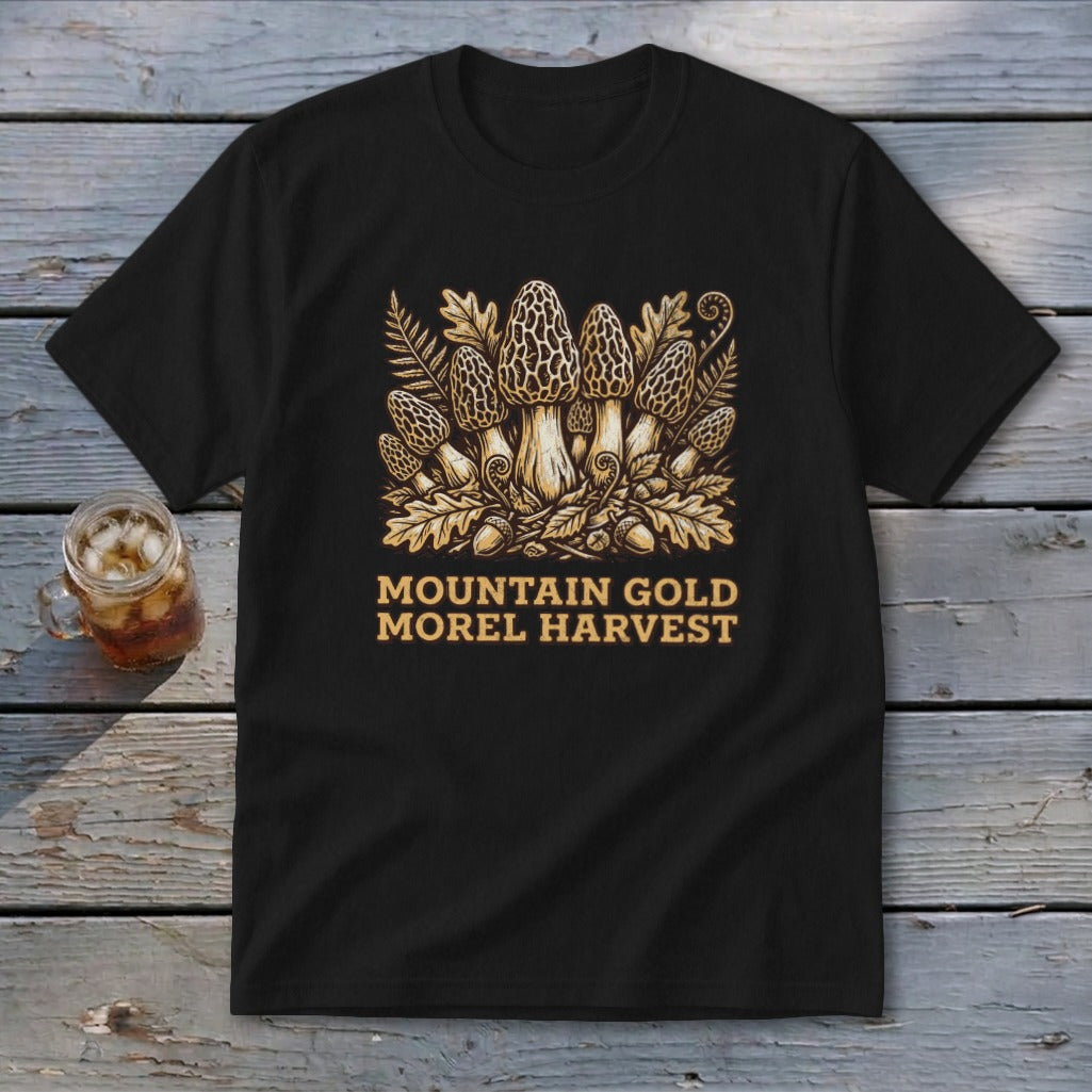 Black t-shirt with a "Mountain Gold Morel Harvest" graphic featuring morel mushrooms and foliage.