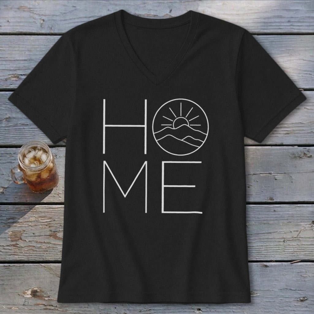 Black V-neck t-shirt with a white graphic reading HOME, where the O is replaced by a mountain and sun design.