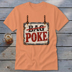 Peach crewneck t-shirt featuring a rustic sign graphic with the words DAG and POKE.