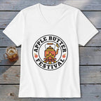 White t-shirt with "Apple Butter Festival" text and kettle graphic.