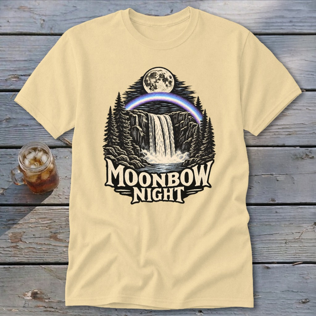 Cream t-shirt with Moonbow Night waterfall, moon, and rainbow graphic.