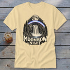 Cream t-shirt with Moonbow Night waterfall, moon, and rainbow graphic.