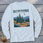 A long-sleeved white t-shirt featuring a green graphic of the Dolly Sods Wilderness landscape with mountains and trees.
