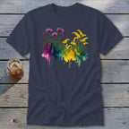 Navy t-shirt with a watercolor floral design of purple and yellow flowers with colorful paint splatters.