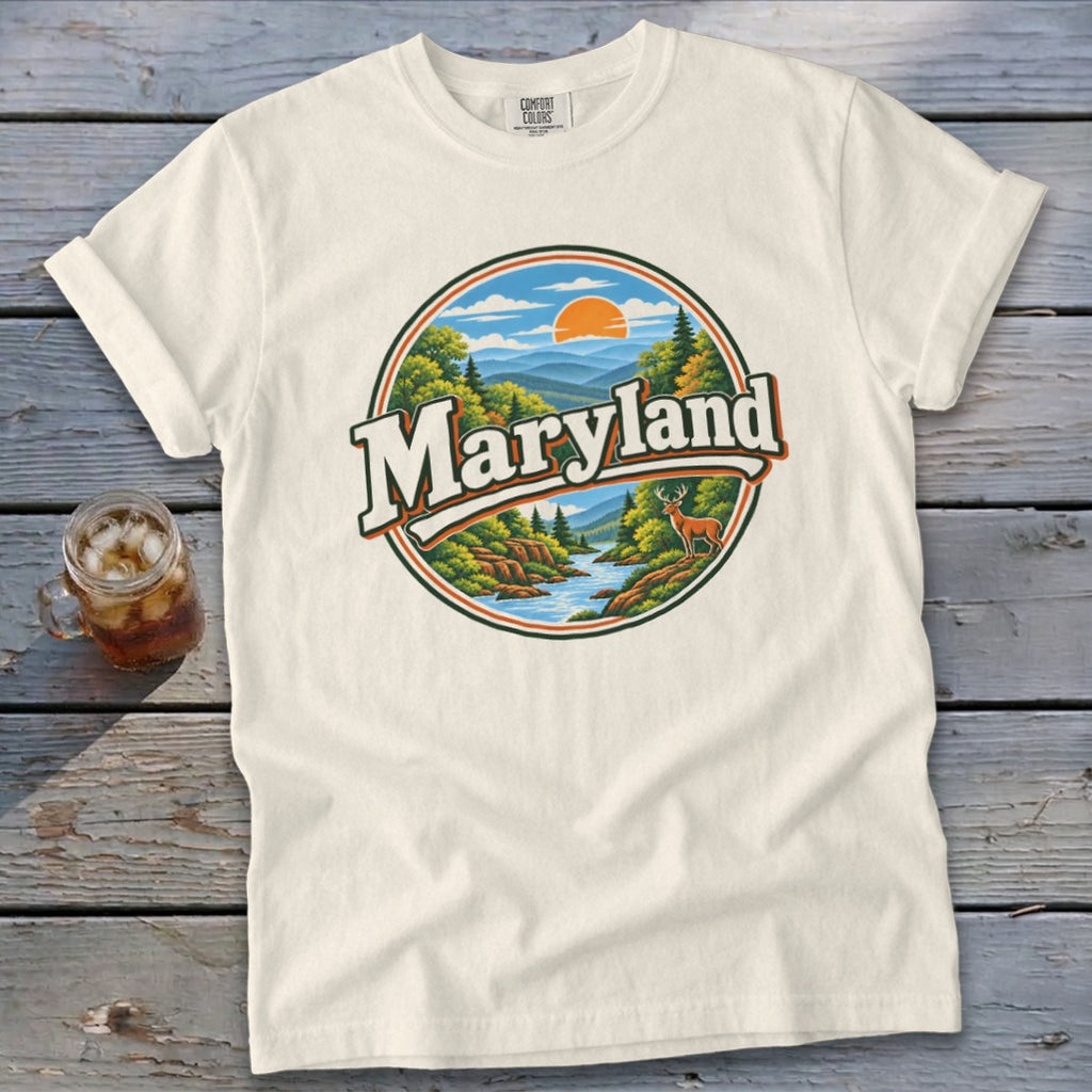 Cream t-shirt with circular Maryland landscape graphic and deer.
