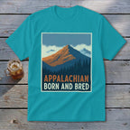 Teal t-shirt featuring a mountain graphic with the text Appalachian Born and Bred.