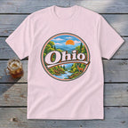 Pink t-shirt with a circular graphic featuring the word "Ohio" and a scenic landscape.