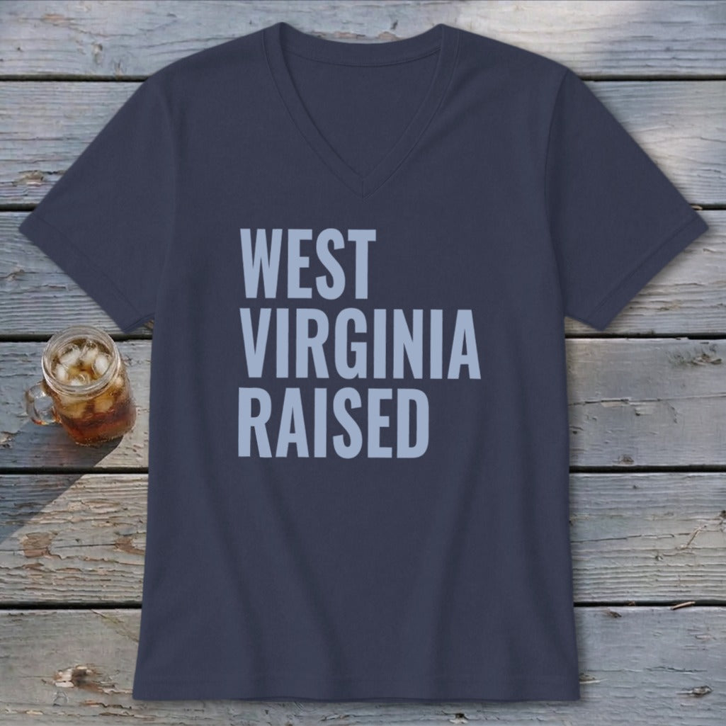 Navy v-neck t-shirt with light blue text "WEST VIRGINIA RAISED".