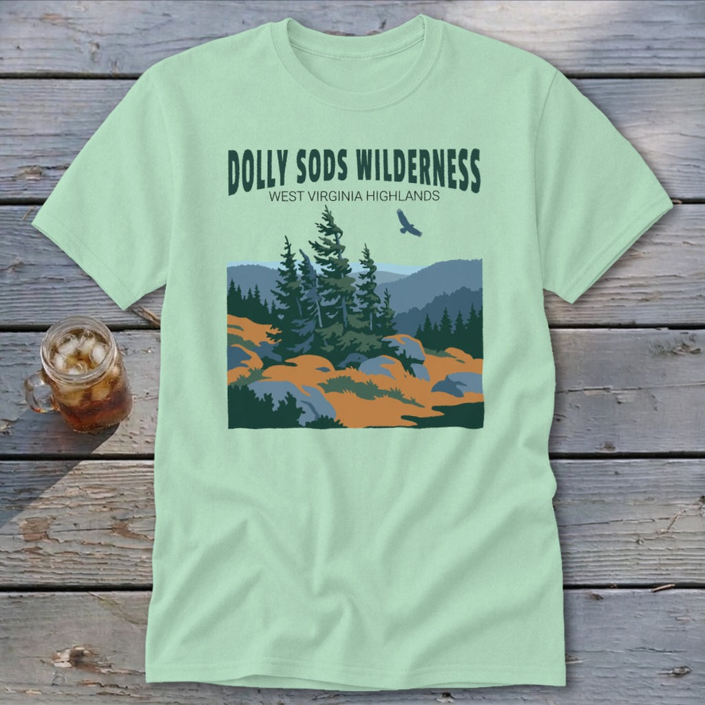 Light green t-shirt with a Dolly Sods Wilderness graphic featuring pine trees and mountains.
