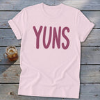 Light pink t-shirt with "YUNS" in dark pink lettering.