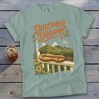 Light blue Comfort Colors t-shirt with "Dulcimer Dreams" text and mountain landscape.
