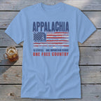 Light blue t-shirt featuring distressed text reading APPALACHIA above an American flag and the phrase 13 STATES ONE MOUNTAIN RANGE ONE FREE COUNTRY.