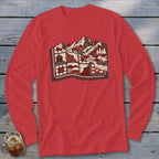 Red long-sleeve shirt with a graphic print of a mountainous landscape layered over a quilt pattern.