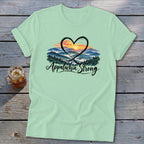 Light green t-shirt with a heart over mountains and "Appalachia Strong" text.