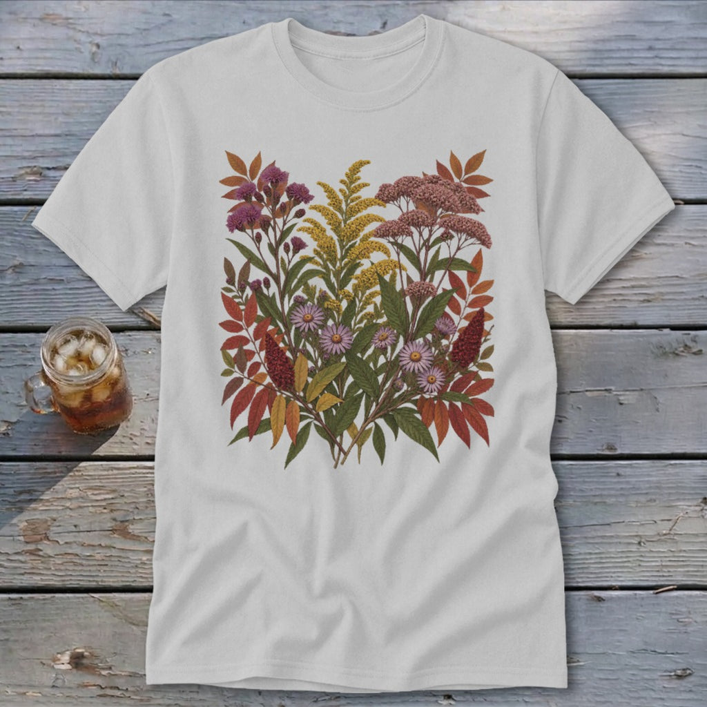 White t-shirt with a watercolor floral arrangement of purple, pink, yellow, and red wildflowers and leaves.