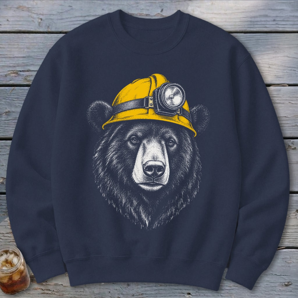 Black bear illustration wearing a yellow hard hat with a headlamp.