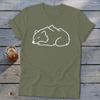 Olive green t-shirt with a sleeping bear outline superimposed on mountains graphic.