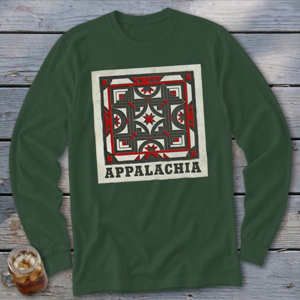 Dark green long-sleeved shirt with a square Appalachian quilt graphic and text on a wooden background.