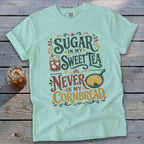 Mint t-shirt with "Sugar in my Sweet Tea, Never in my Cornbread" graphic.