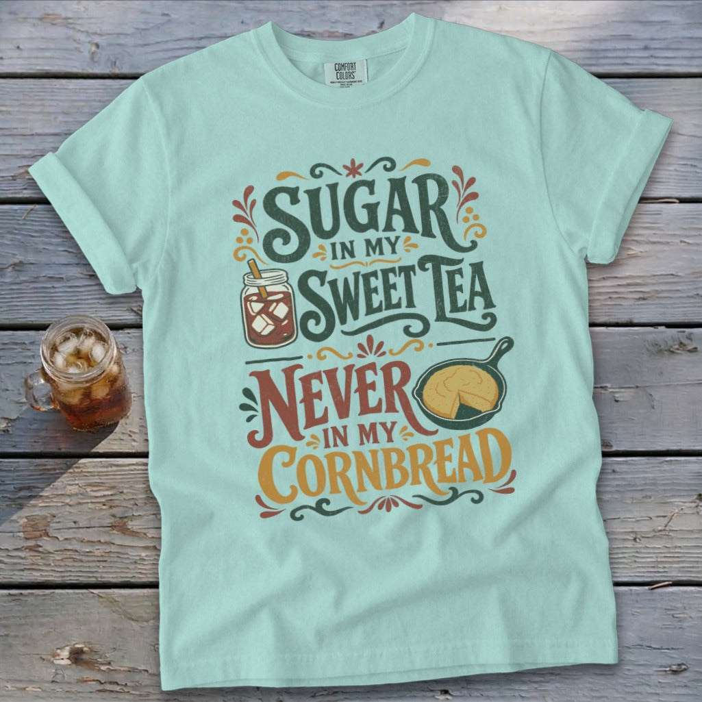 Mint t-shirt with "Sugar in my Sweet Tea, Never in my Cornbread" graphic.