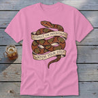 Pink t-shirt with coiled snake graphic and text: "Respect The Mountains Watch Your Step."