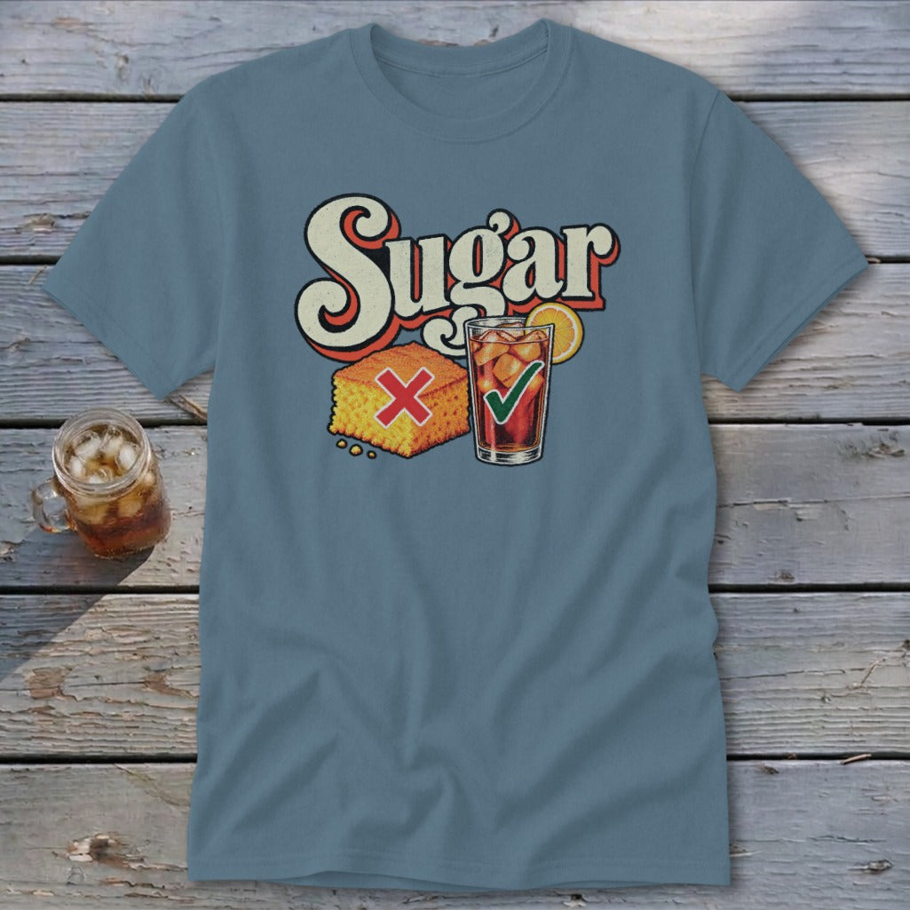 A slate blue t-shirt printed with the word Sugar, a cornbread piece with a red X, and a sweet tea glass with a green checkmark.